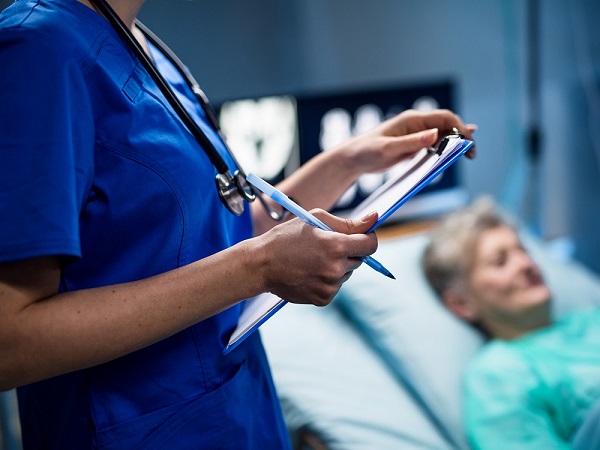 Midsection of doctor in hospital, coronavirus concept.